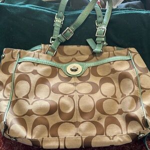 Coach bag, vinyl with leather handles. Some wear, see pictures.